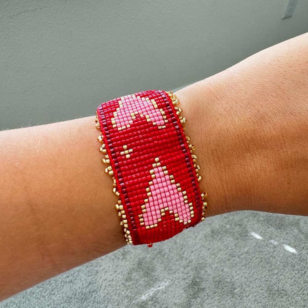 Handcrafted Red Beaded Bracelet with Pink Hearts